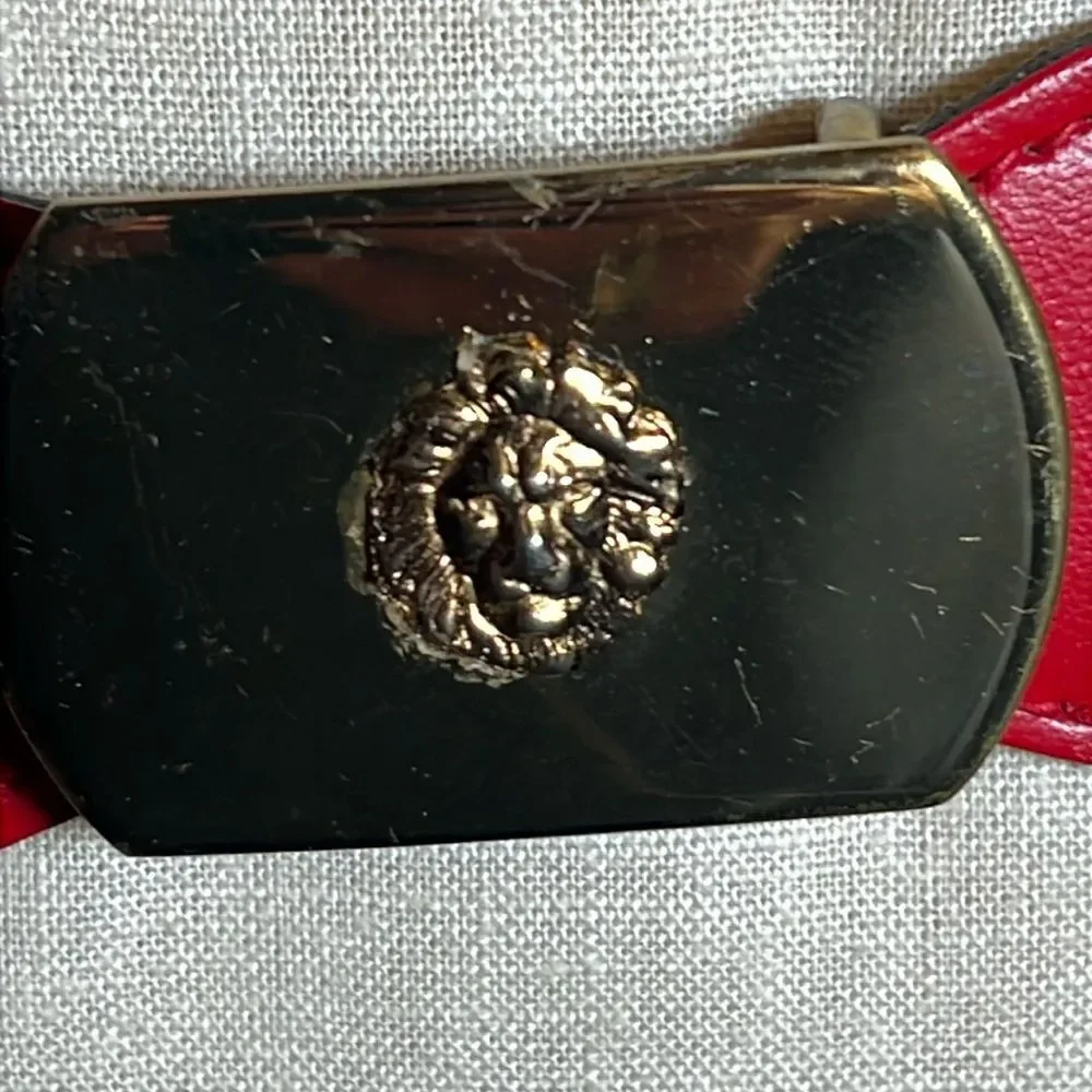 VINTAGE Anne Klein red stretch belt with gold buckle.